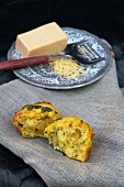 Cheese and herb muffins, halved