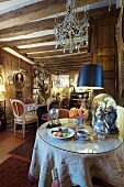 Cafe decorated with antique furniture, paintings and flea-market finds