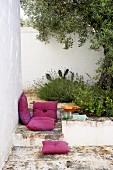 Floor cushions and picnic on terrace