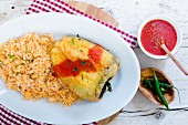 Chile Relleno (stuffed peppers with tomato sauce and red rice, Mexico)