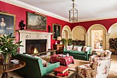 Classic living room in red and green in Cornwell Manor