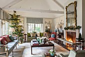 Festive English-style living room with open fireplace