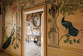 Traditional murals of birds and plants in bathroom