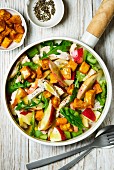 Colourful apple and chicken salad