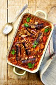 Lentil casserole with sausages, carrots and onions