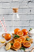 Ingredients and kitchen utensils for making blood orange smoothies