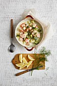 Potato stew with broccoli and salmon fillet