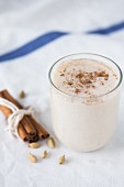 Hot oat milk with cinnamon and cardamom