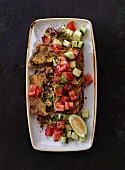 Kibbeh with mince, tomatoes and cucumbers (Lebanon)