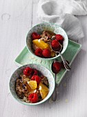 Amaranth porridge with orange, almonds and dried cranberries
