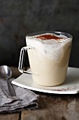 A white coffee and almond smoothie with coconut