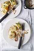 Oven-baked herb omelette with creamy chanterelle mushroom and ham sauce