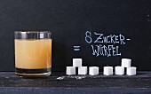 200 ml of apple juice contains eight cubes of sugar