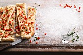 Tarte flambée with bacon and chives