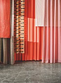 Curtain fabrics in red tones