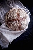 Sourdough bread on a muslin cloth