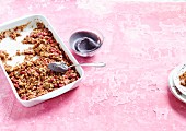 Vegan strawberry and rhubarb crumble with coconut blossom sugar and blueberry and cashew cream