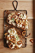 Bavarian Obatzda cheese spread topped with salty mini pretzels on farmhouse bread