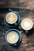 Latte art in cappuccinos