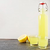 Limoncello in a bottle and glasses