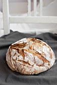 A loaf of homemade sourdough bread (wheat and rye flour with rye sourdough)