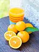 Orange juice squeezed from freshly picked amall Portuguese oranges
