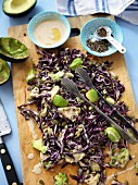 A red cabbage salad with avocado