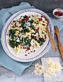 Pasta with palmetto, ricotta and pomegranate seeds