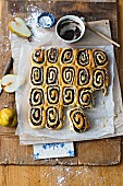Poppy-seed cakes with pear and orange icing