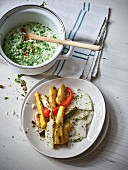 Roasted summer vegetables with a kohlrabi salad, and pea mash with smoked tofu