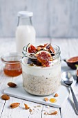 Overnight oats with figs and honey in a glass