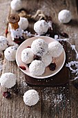 Gluten-free coconut balls with oat bran and dried cranberries