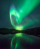 Aurora borealis over a lake