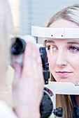 Woman having eye examination
