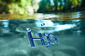 The chemical symbol for water, H2O