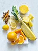 Pineapple and orange drink with lemon and turmeric