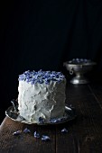 A mascarpone cream cake with candied violets