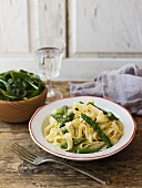 Fettuccine Alfredo: tagliatelle with green asparagus and baby leaf spinach
