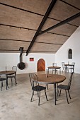 Black metal furniture in modern tasting room