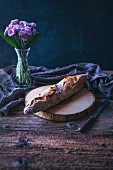 Sourdough baguette on a rustic wooden table