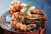 Grilled king prawns with thyme and lemon peel