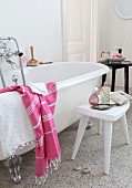 White free-standing bathtub in vintage interior