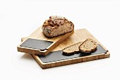 Bread on bamboo and slate chopping boards