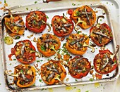Stuffed peppers on a baking tray