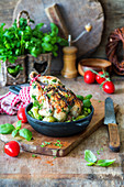 Roast chicken with herbs and vegetables