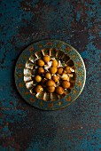 Gulab Jamun (fried dough balls in sugar syrup, India)