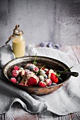 Frozen berries witha creme anglaise sauce, dairy free