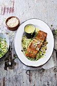 A salmon fillet on courgette noodles with coconut and coriander cream