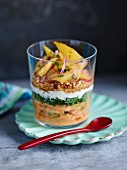 Thai curry trifle with chicken and mango in a glass