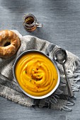 Orange and sweet potato soup with maple syrup